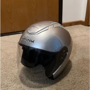 Full face helmet silver hawk. Size medium DOT approved. Like new. Never used